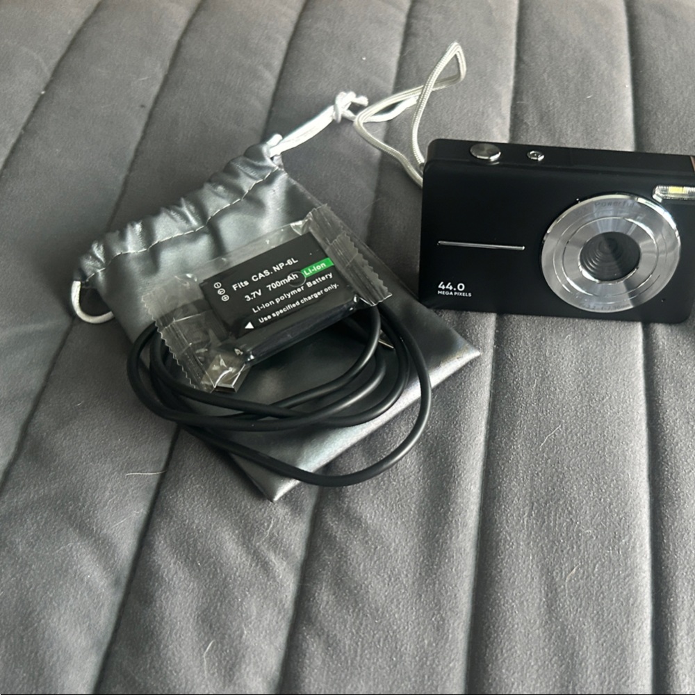 Black Digital Camera with Accessories
